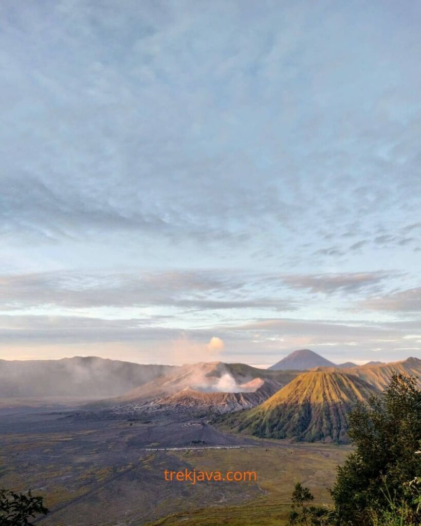sunrise view from Seruni Point at Mount Bromo with Mount Semeru and Mount Batok