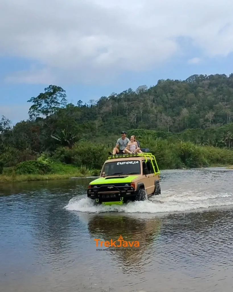 Jeep crossing a river on the way to Sukamade Beach